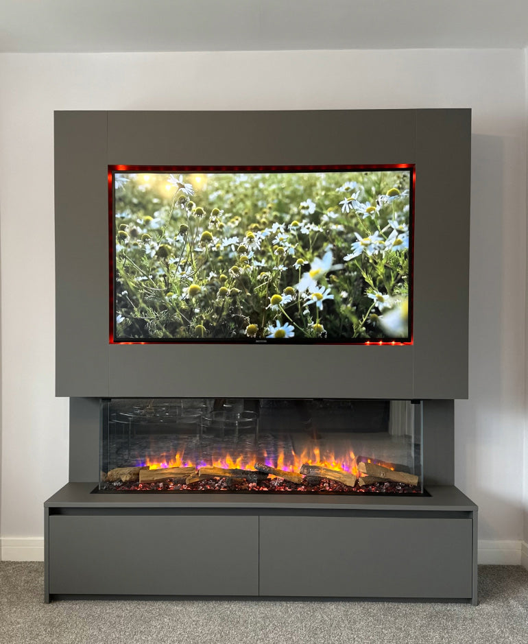 Modern electric fireplace with a screen displaying nature scenery in a living room setting.